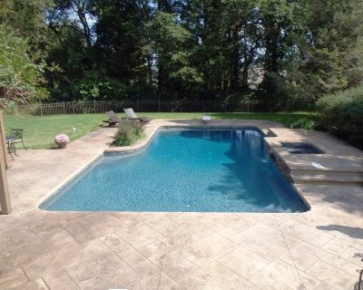 Image of renovated swimming pool with blue water